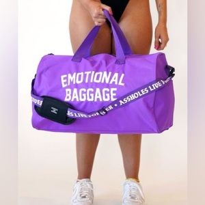 Super cute Purple “Emotional Baggage” duffel bag. Assholes Live Forever.
